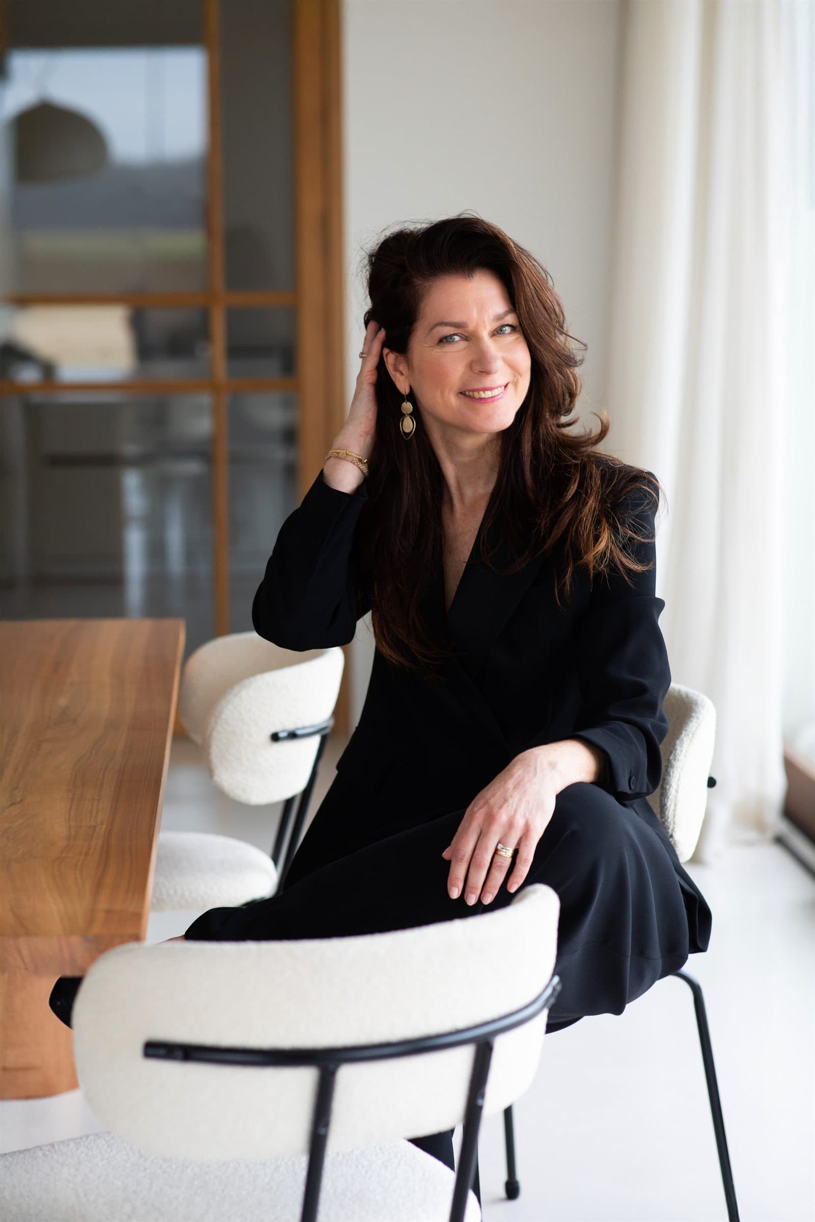 Portret van Mariska de Kleijne, executive coach voor bestuurders en directeuren